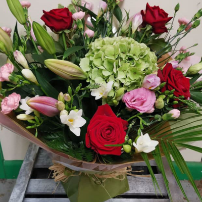 Sweet Romance - A bouquet of mixed beautiful roses is sure to create a lasting impression.